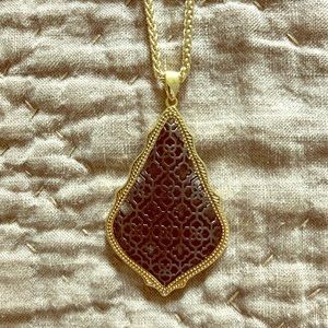 TWO Kendra Scott layering necklaces.